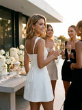 Why the Ivory Satin Mini Dress is Turning Heads at Homecoming